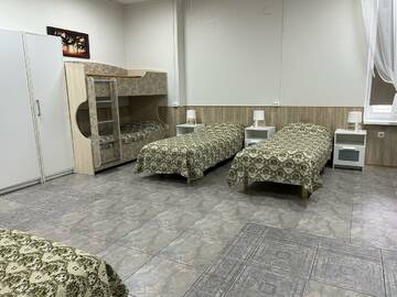 Фото номера Кровать в 7-местном общем номере Гостиница Хозяюшка г. Костомукша 5